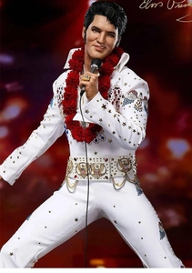 Detailed close-up of Elvis Presley action figure in white iconic jumpsuit and red lei