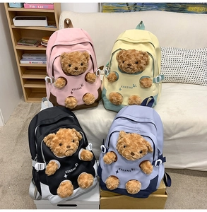 Detailed comparison of cute teddy bear backpacks in pink, yellow, black and lilac colors