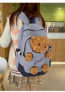 Detail of light purple backpack with 3D plush bear doll and KEKEMI brand print logo
