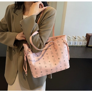 Detail of pink tote bag with teddy bear print and adjustable long shoulder strap