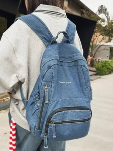 Mochila vaquera vintage lavada para mujer con bordado 7street estilo casual