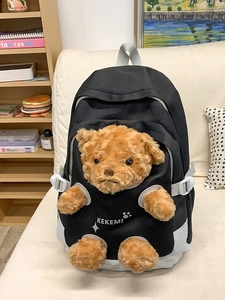 Cute black backpack featuring a plush brown teddy bear design and KEKEMI logo