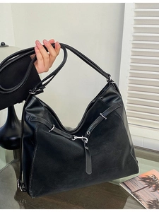 Large capacity black mixed leather shoulder bag with buckle detail in modern style