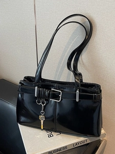 Retro black patent leather shoulder bag with buckle detail and silver key charm