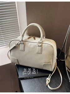Minimalist cream white Boston handbag in premium PU leather with adjustable shoulder strap