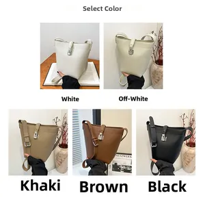 Detail showing five colors of lychee grain bucket bags with silver metal buckles