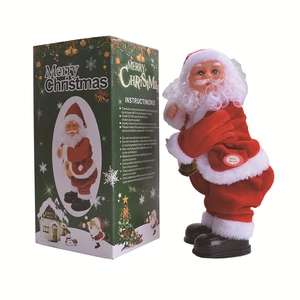 Dettaglio di Babbo Natale accanto alla sua confezione verde con istruzioni d'uso incluse