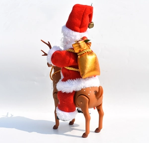Detail of Santa Claus riding a reindeer toy with a golden gift bag and plush outfit