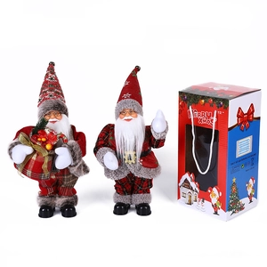 Detailed look at musical Santa Claus dolls with festive gift boxes and 12-inch plush figures