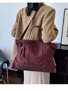 Vintage burgundy tote bag with fringe and rivets, spacious shoulder bag for women