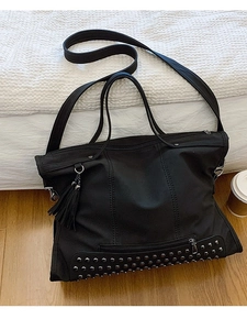 Vintage black tote bag with silver rivets and tassels, large capacity for women