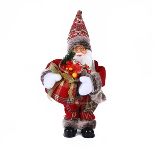 Detail of Santa Claus figurine in red plaid outfit with gift bag and white beard