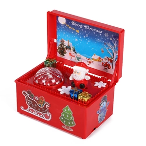 Electric musical Santa Claus gift box with glowing crystal ball and festive decorations