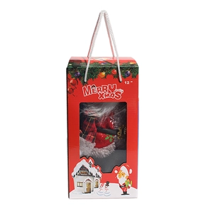 Animated 12-inch musical Santa Claus doll in a festive red gift box with carrying handle