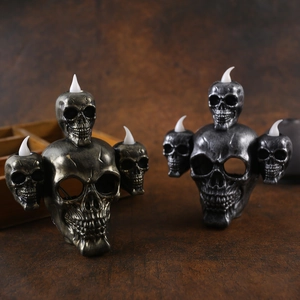 Halloween LED skull candle lights in antique gold and silver for gothic home decor
