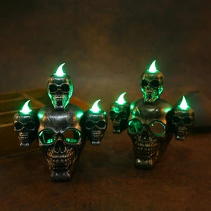 Halloween skull LED candle lamp with eerie green glow for spooky party decor