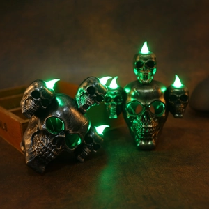Halloween skull LED lamp with green glow and vintage metallic finish for ghost house decor
