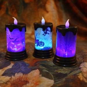 Candele LED di Halloween con motivi di zucca, strega e pipistrello su basi nere