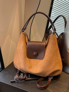 Caramel and brown faux suede tote bag with versatile shoulder and backpack straps