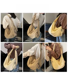 Detailed views of large canvas hobo bag with adjustable strap and small coin purse