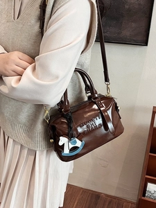 Retro coffee brown Boston handbag with MUHETI embossed logo and horse charm