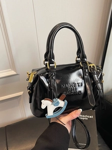 Retro black patent leather Boston bag with letter embossing and rocking horse charm