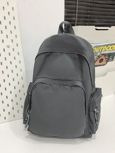 Sac à dos gris foncé minimaliste de grande capacité avec plusieurs poches pour étudiants