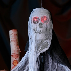 Detail of Halloween hanging ghost with glowing red LED eyes and black plastic chains