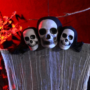 Three-headed hanging skeleton ghost decoration with tattered white gauze for Halloween party