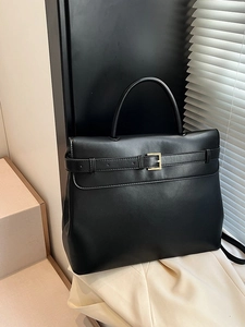 Classic black leather handbag with gold metal buckles and large capacity for women