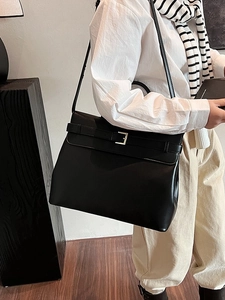 Classic black large faux leather tote bag with flap and metal buckle detail for women