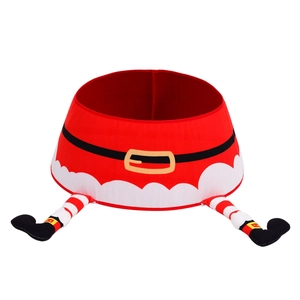 Detail of Christmas tree skirt base with red velvet fabric and striped legs decoration