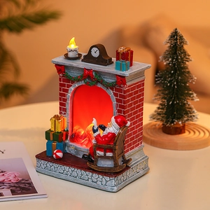 Christmas fireplace scene resin figurine with glowing LED light and Santa Claus decor