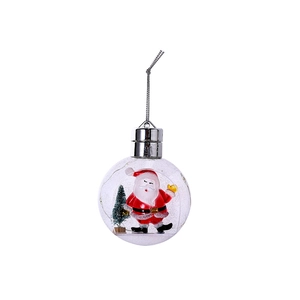 Luminous clear Christmas ball ornament with Santa, tree, and snow inside hanging piece