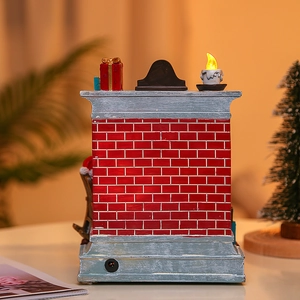 Detail of Christmas fireplace lamp with red brick texture and top candle decoration