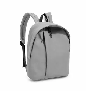Detailed side view of grey minimalist backpack with breathable mesh shoulder straps