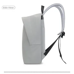 Detailed side view of grey minimalist backpack featuring breathable mesh shoulder straps