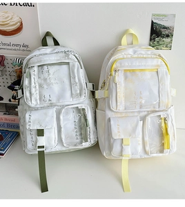 Detail of Chinese calligraphy print and PVC front pocket on aesthetic backpack