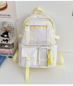 Detail of Chinese style backpack featuring calligraphy prints and multi-pocket storage