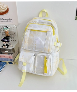 Detail of off-white school backpack with calligraphy pattern and clear PVC pocket