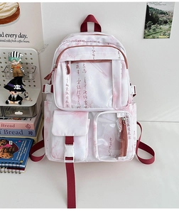 Close-up of pink ink painting design and PVC clear window pocket on the white backpack