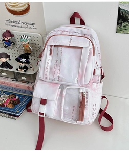 Detailed view of Chinese calligraphy print backpack with pink and white gradient effect