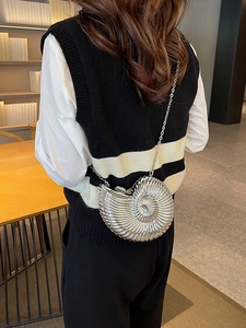 Chic silver snail-shaped acrylic clutch bag with a metallic finish and chain strap