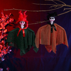 Halloween ghost doll hanging ornaments in green and orange with feather and veil detail