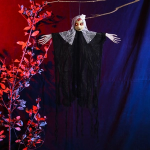 Close-up of hanging Halloween ghost with glowing red LED eyes and black tattered robes