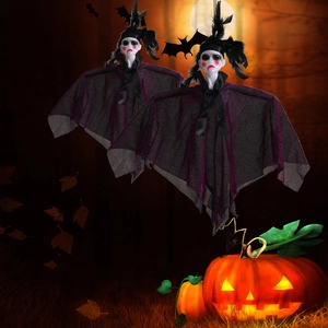 Hanging Halloween vampire ghosts with purple tulle capes and black feather headbands