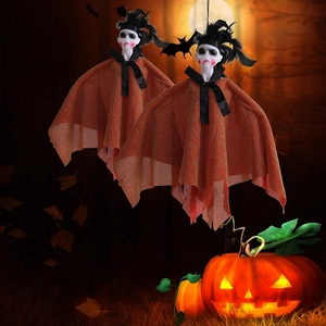 Halloween hanging ghost dolls in orange glitter capes with pumpkins and bats decor