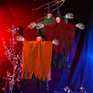 Three Halloween hanging ghost skeletons with glowing red eyes for spooky party decor