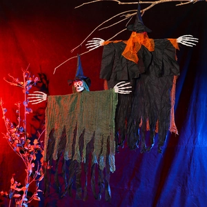 Close-up of Halloween hanging ghosts with glowing red LED skeleton eyes and wizard hats