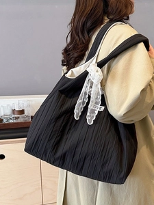 Minimalist black pleated tote bag with white lace bow charm and large capacity